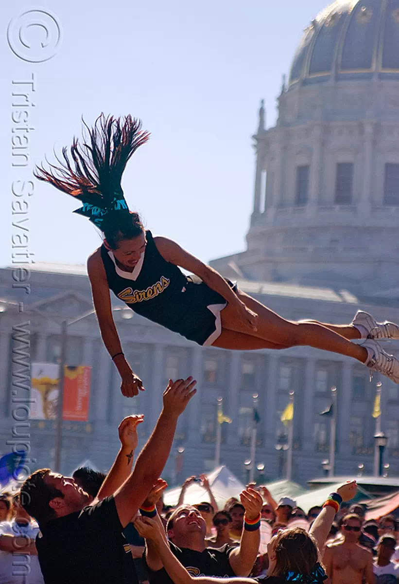 acrobatics - cheer leaders, civic center, crowd, gay pride festival, stock photo