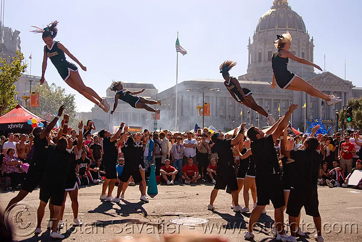acrobatics - cheer leaders, civic center, crowd, gay pride festival, stock photo