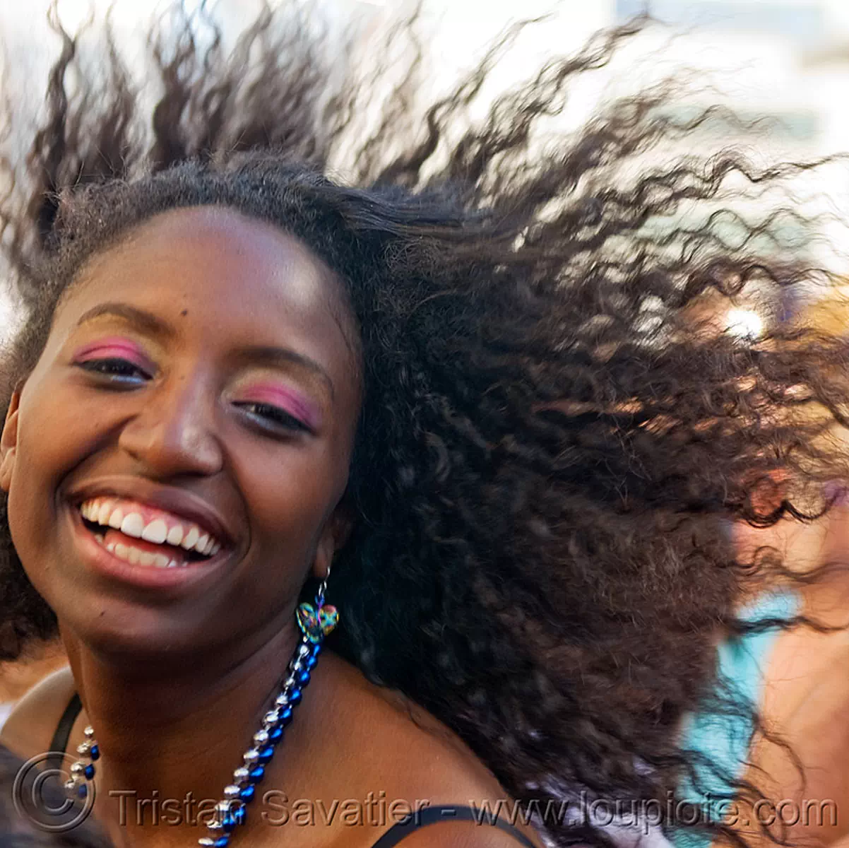 black girl dancing, gay pride festival, lelani, stock photo