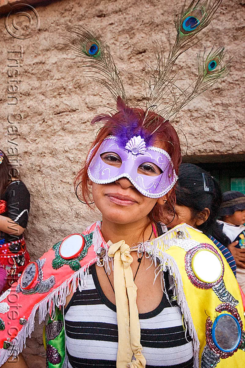 woman with carnival mask - carnaval de humahuaca (argentina), costume, diabla, diablo carnavalero, diablo de carnaval, folklore, horns, mirrors, noroeste argentino, peacock feathers, quebrada de humahuaca, tribal