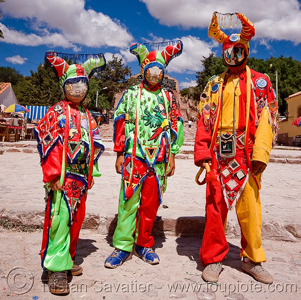 diablos carnavaleros - carnaval de humahuaca (argentina), carnival, costume, diablo carnavalero, diablo de carnaval, diablos de carnaval, folklore, green, horns, mask, men, mirrors, noroeste argentino, quebrada de humahuaca, red, three, tribal, yellow, stock photo