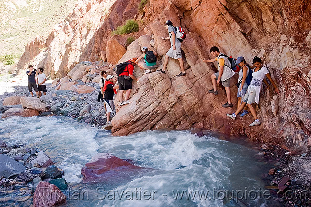 trekking - some scrambling to avoid a river crossing, iruya, men, noroeste argentino, quebrada de humahuaca, river bed, san isidro, trail, water, women, stock photo