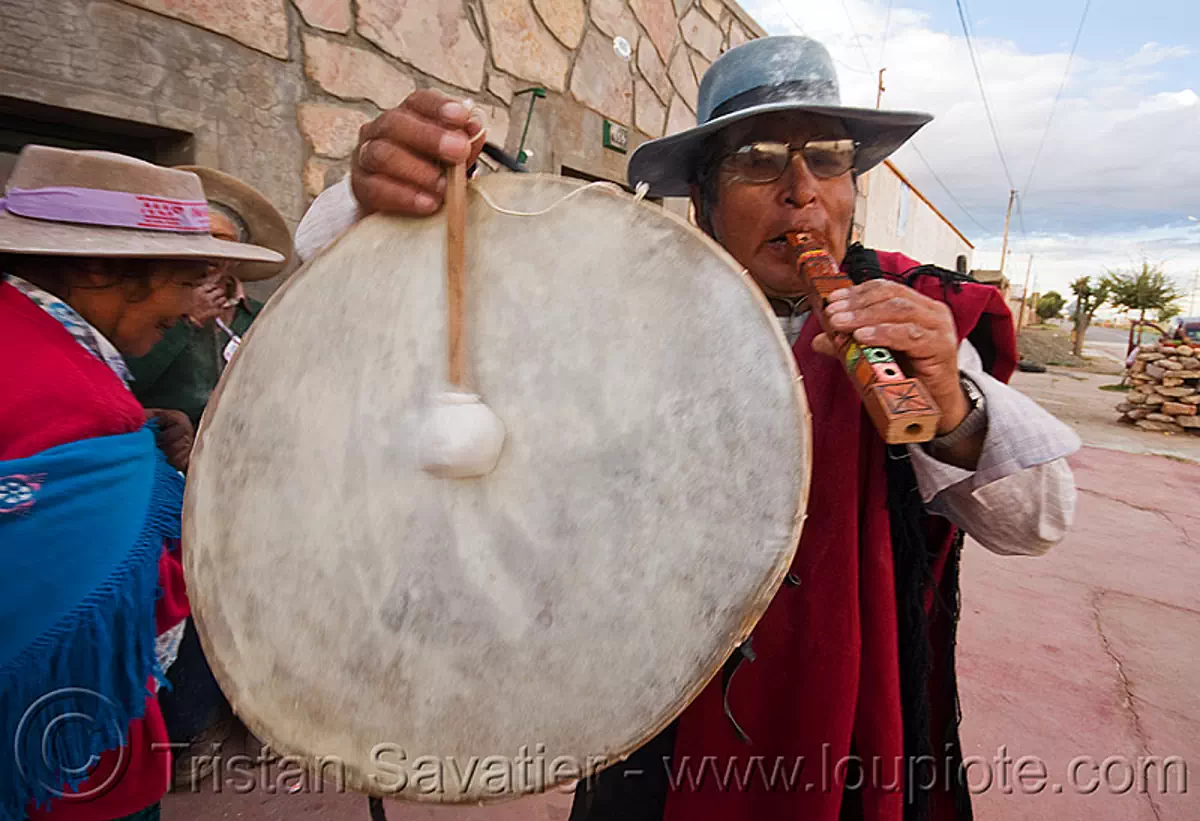 traditional andean caja drum and flute, abra pampa, carnaval, carnival, drummer, drumming, folklore, gaucho, hat, man, music, noroeste argentino, old, quebrada de humahuaca, stock photo