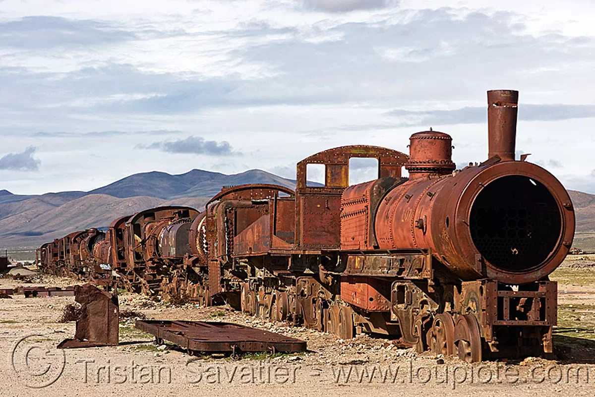 rusty steam train cemetery, uyuni, bolivia