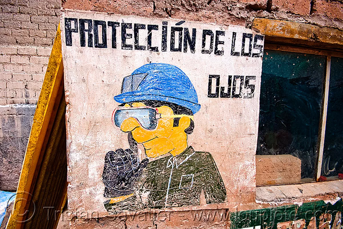 safety goggles sign - "protecci&oacute;n de los ojos", cerro rico, man, mina candelaria, mine worker, miner, mining, potos&iacute;, safety sign, stock photo