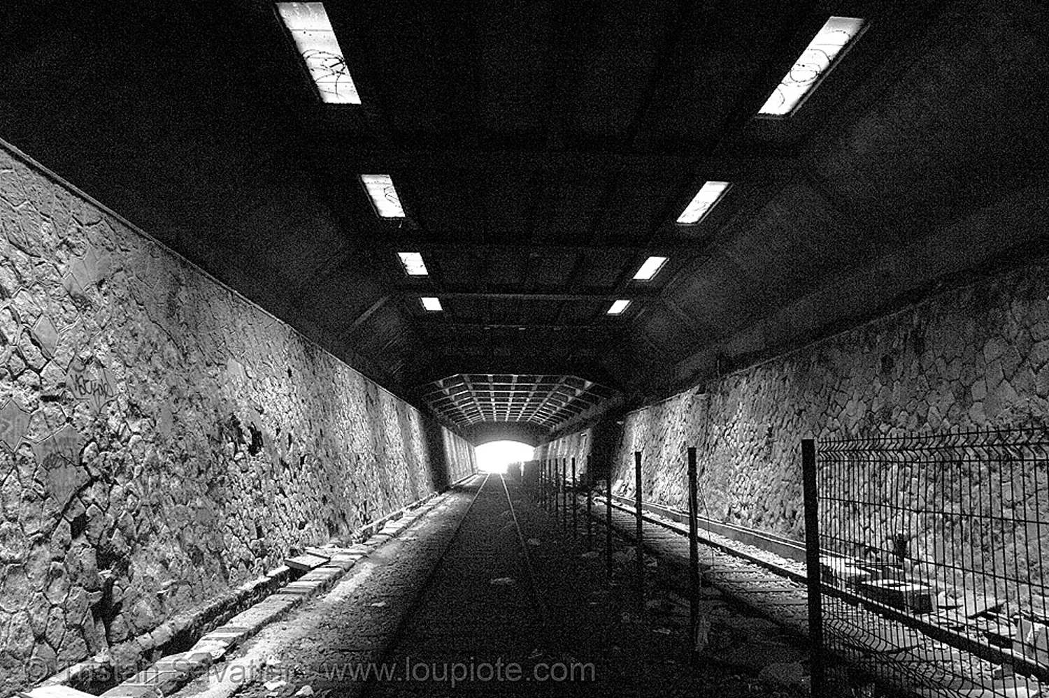 train tunnel - abandoned underground railway (paris, france), petite ceinture, railroad tracks, rails, railway tunnel, trespassing, urban exploration, stock photo