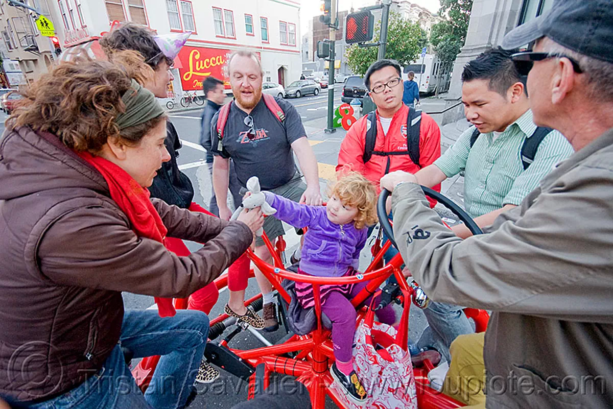 riding the conference bike, child, cobi, conferencebike, eric staller, human powered, kid, pedal powered, red, street, vehicle, stock photo