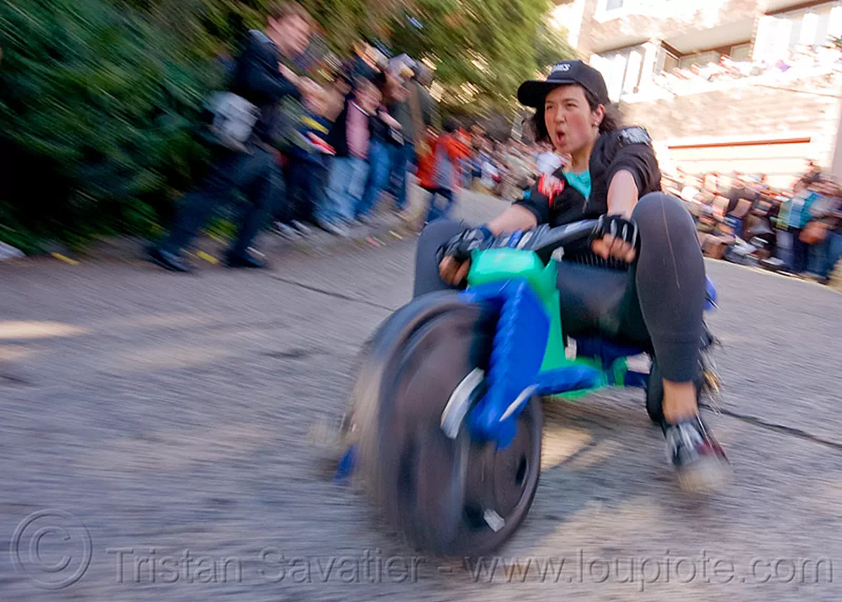BYOBW - "bring your own big wheel" race - toy tricycles (san francisco), byobw 2011, drift trikes, fast, potrero hill, speed, speeding, toy tricycle, toy trike, trike-drifting, stock photo