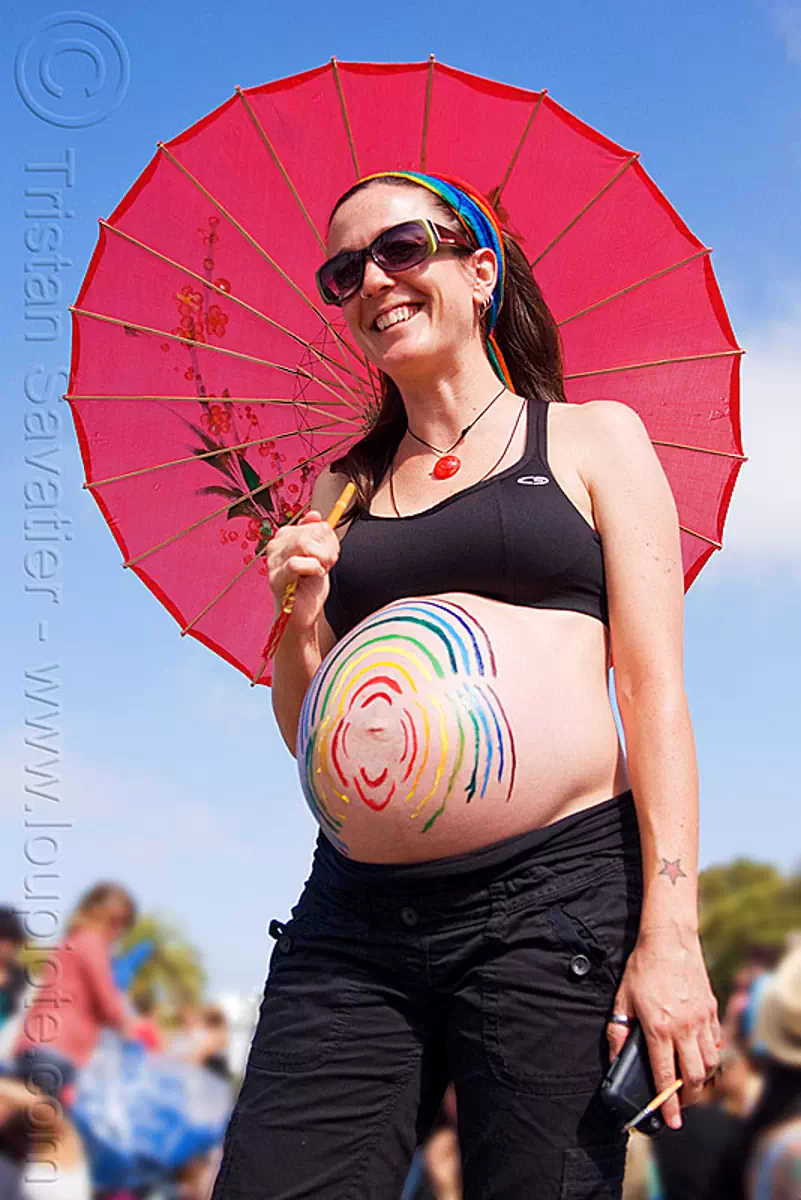 pregnant with red umbrella, dolores park, gay pride festival, japanese, stock photo