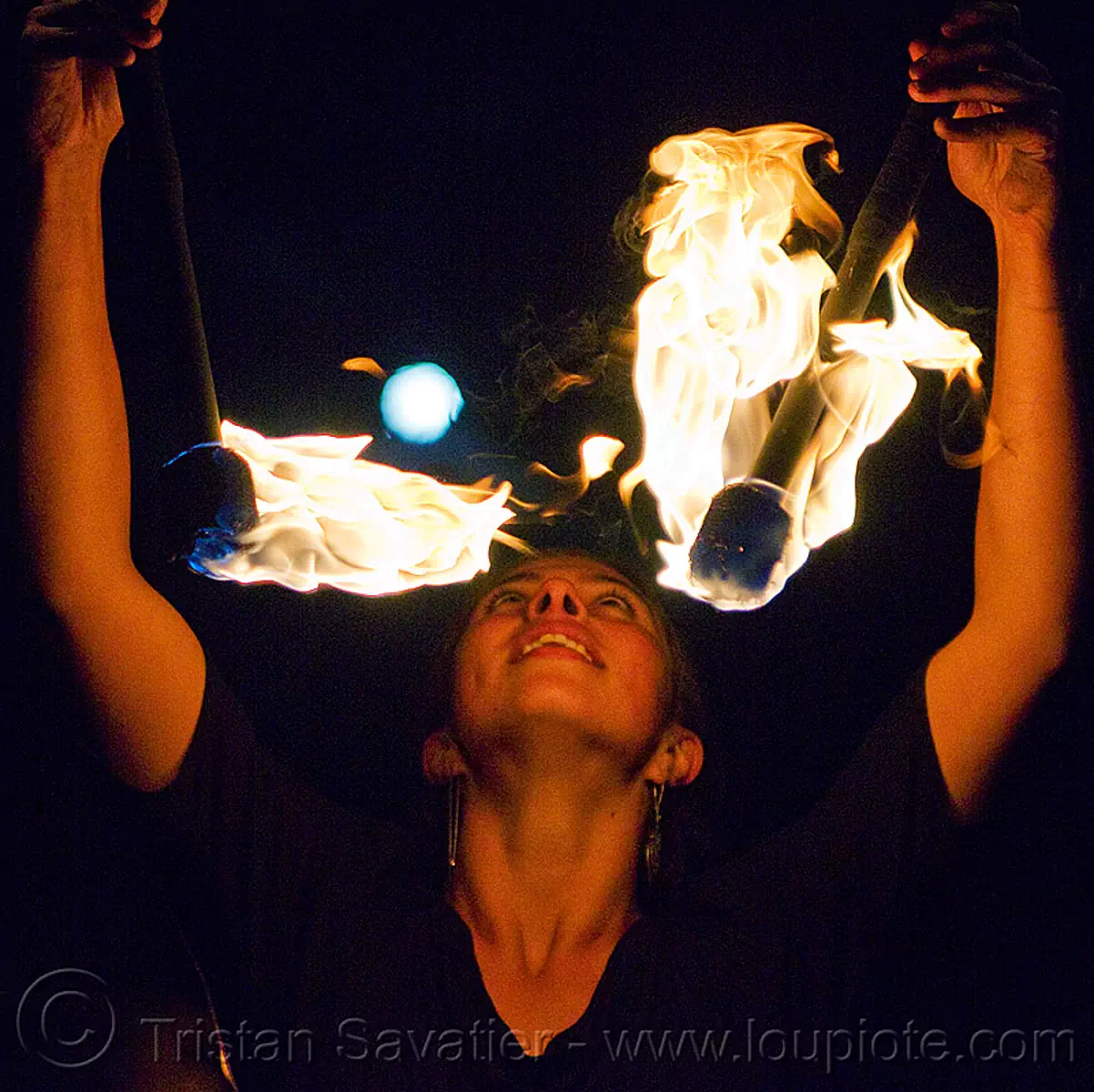 savanna spinning fire staffs under the full moon, double staff, fire dancer, fire dancing, fire performer, fire spinning, fire staves, flame, night, stock photo