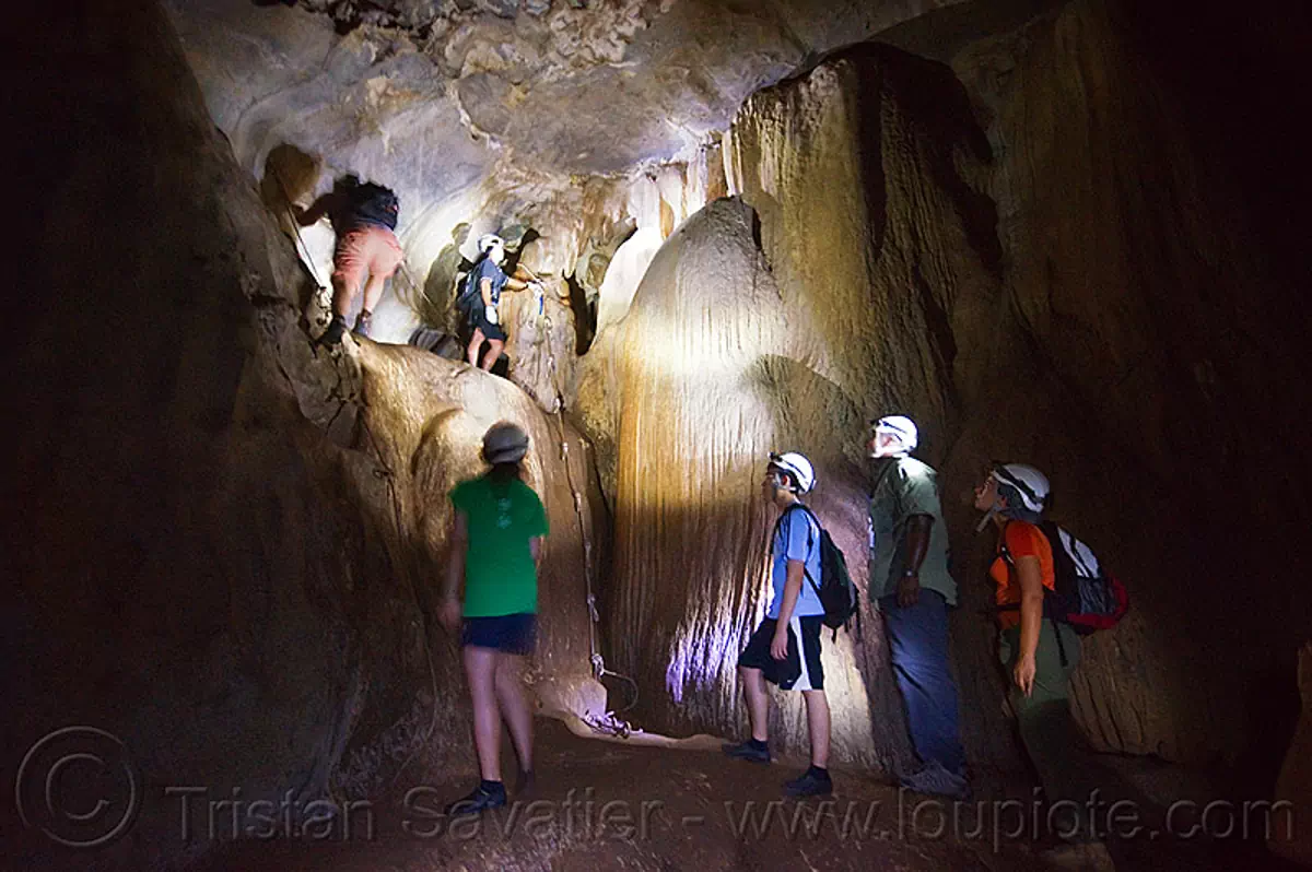 caving in mulu - racer cave (borneo), cave formations, cavers, concretions, gunung mulu national park, knotted rope, natural cave, speleothems, spelunkers, spelunking, wall