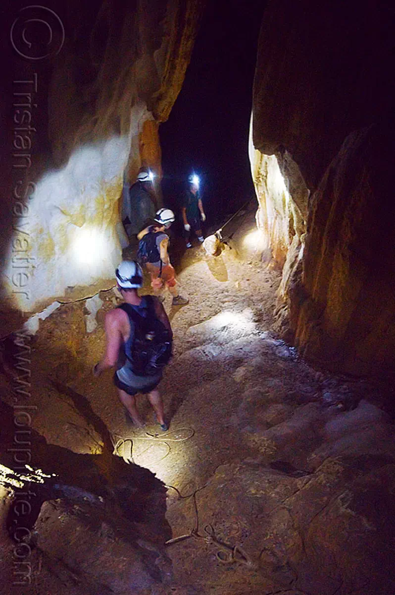 caving in mulu - clearwater cave - mulu (borneo), cavers, clearwater cave system, clearwater connection, gunung mulu national park, knotted rope, natural cave, roland, spelunkers, spelunking, stock photo