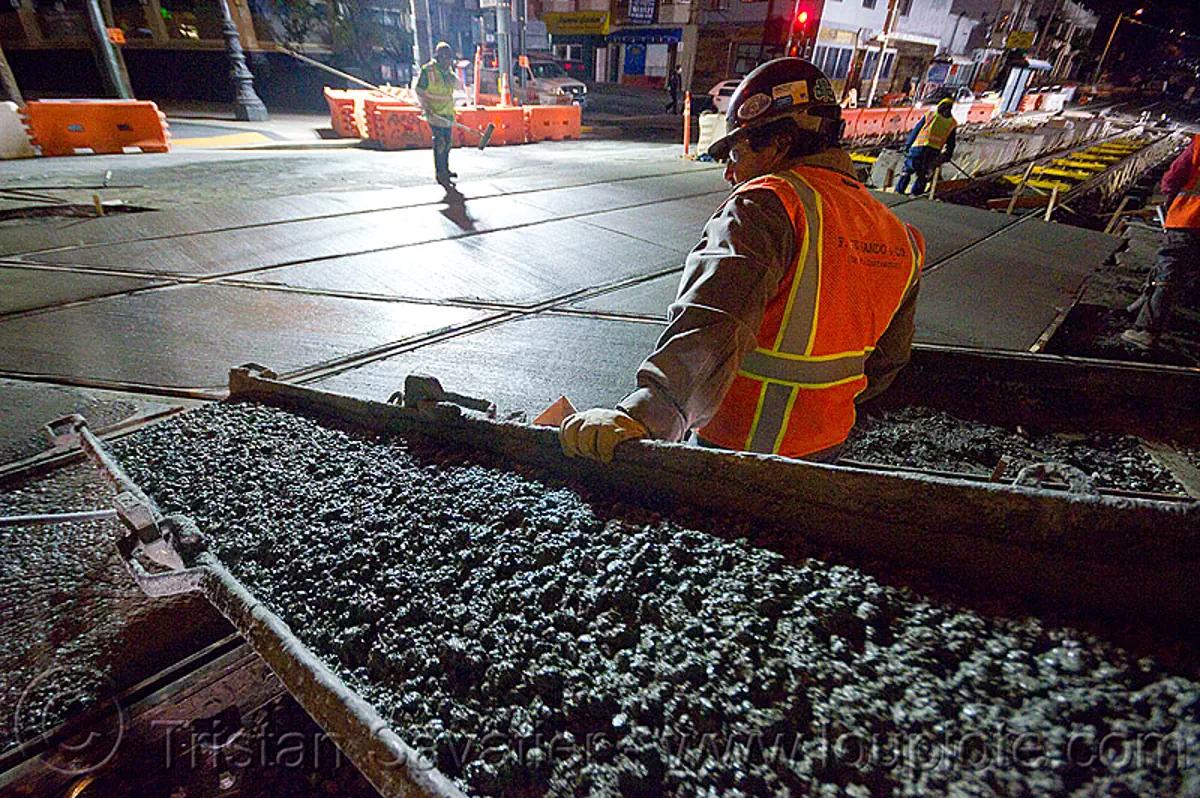 concrete chute, cement chute, light rail, men, muni, night, ntk, railroad construction, railroad tracks, rails, reflective vest, safery vest, safety helmet, san francisco municipal railway, track maintenance, track work, workers