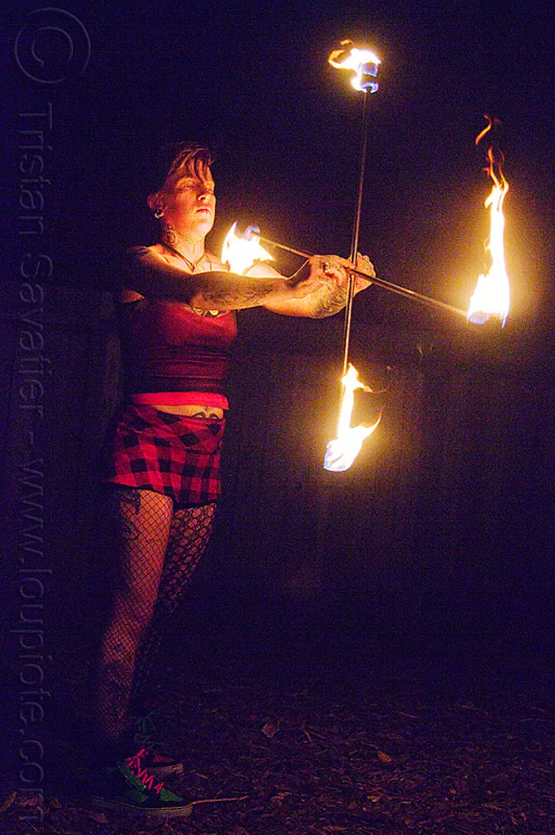 spinning crossed fire staffs, fire dancer, fire dancing, fire performer, fire spinning, fire staves, flame, leah, night