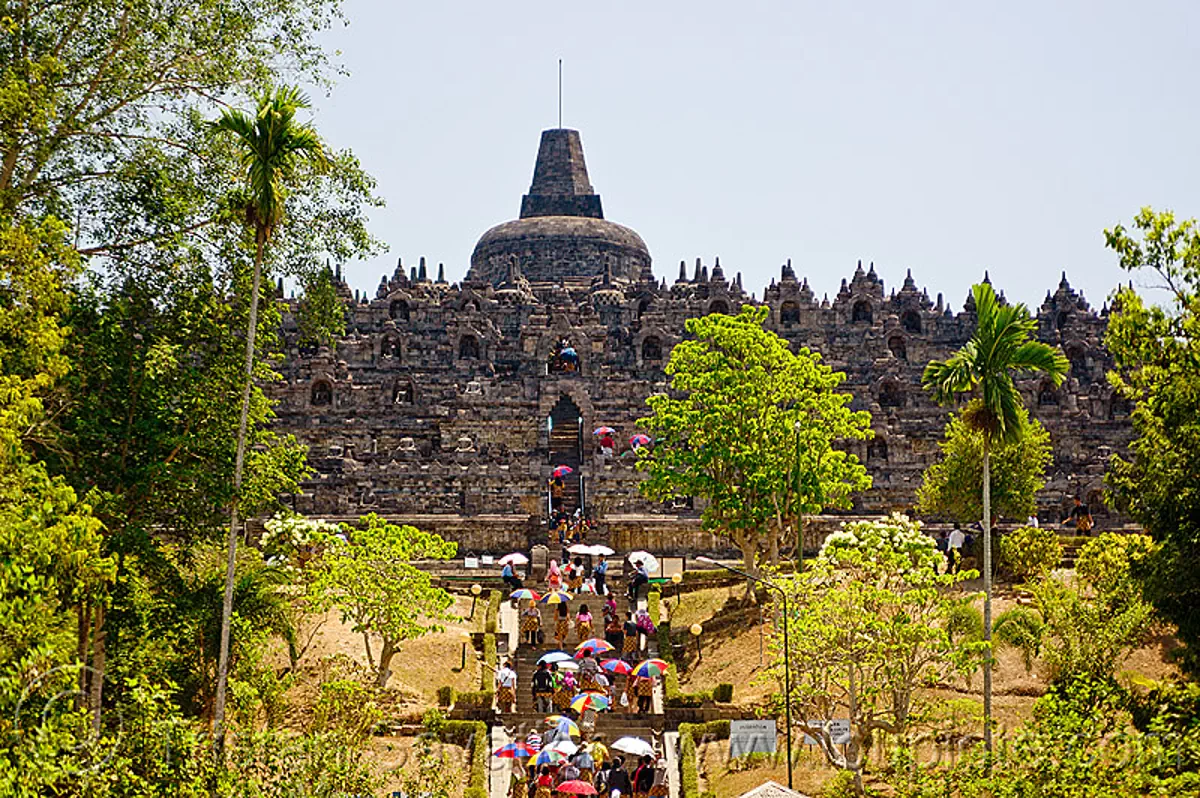borobudur temple, archaeology, buddhism, buddhist temple, crowd, java, jogja, jogjakarta, monument, trees, umbrellas, yogyakarta, stock photo