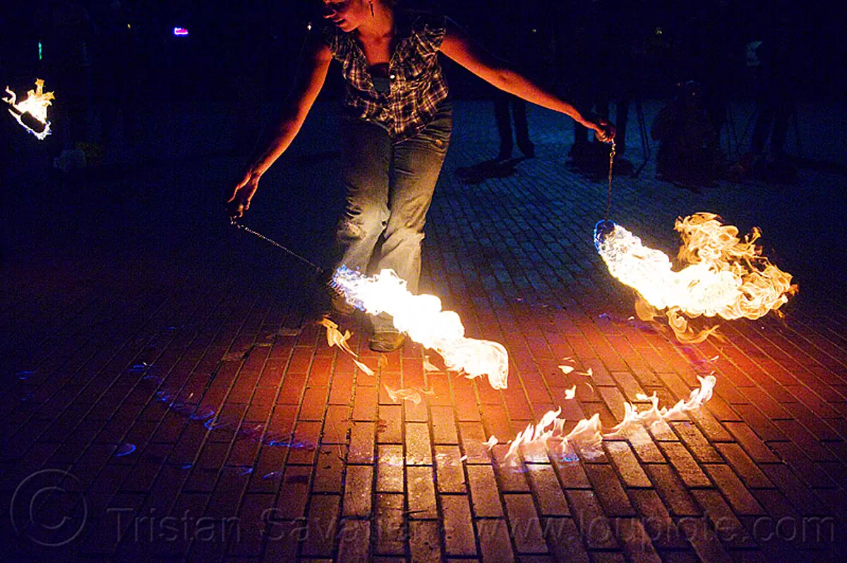 savanna spinning fire poi, fire dancer, fire dancing, fire spinning, flame, night, stock photo