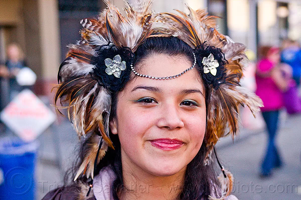 young woman with feather headdress, how weird festival, p-kok, stock photo