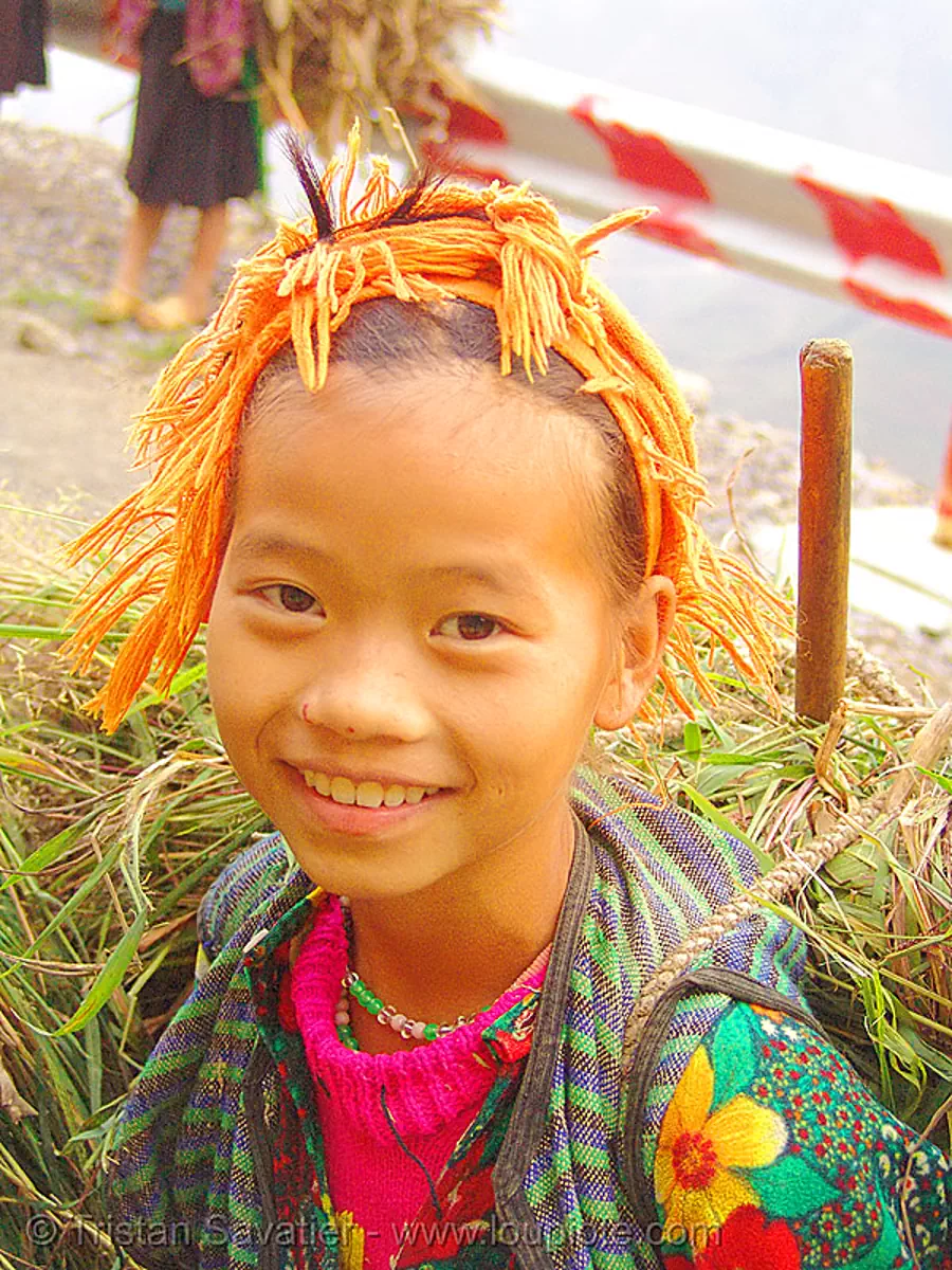 tribe girl carrying grass - vietnam, child, happy smile, hill tribes, kid, ma pi leng pass, m&atilde; p&iacute; l&egrave;ng pass