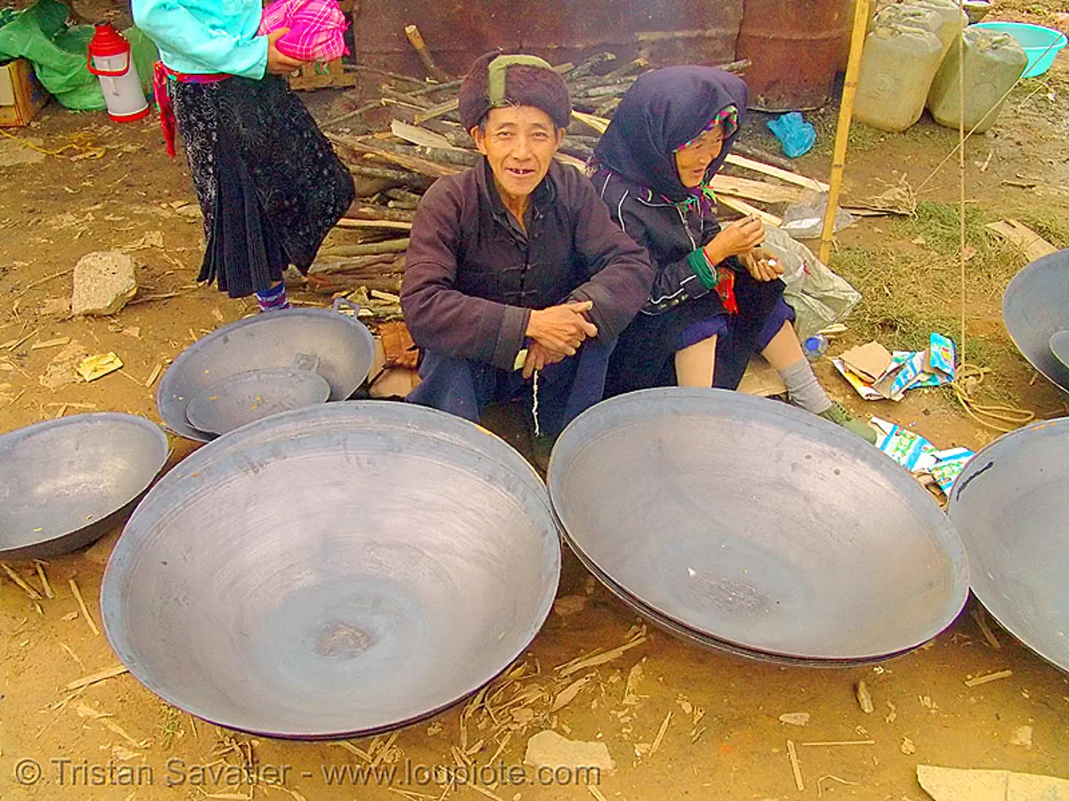 big woks at the market - vietnam, asian woman, couple, hill tribes, man, m&egrave;o vạc, old, stock photo