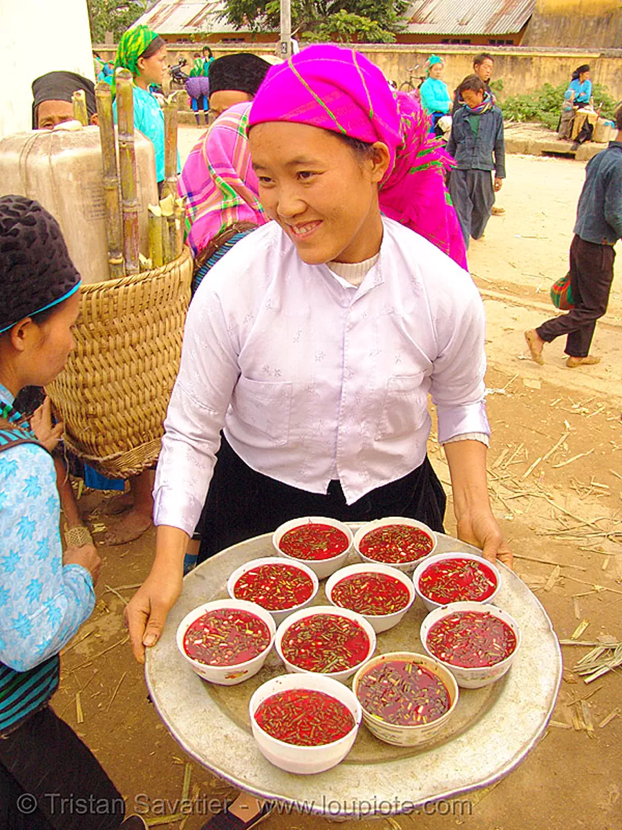 tiết canh (tiet canh) is raw blood soup - vietnam, asian woman, bowls, breakfast, coagulated blood, duck blood, hill tribes, market, m&egrave;o vạc, poultry, red, tiết canh, tribe girl, stock photo