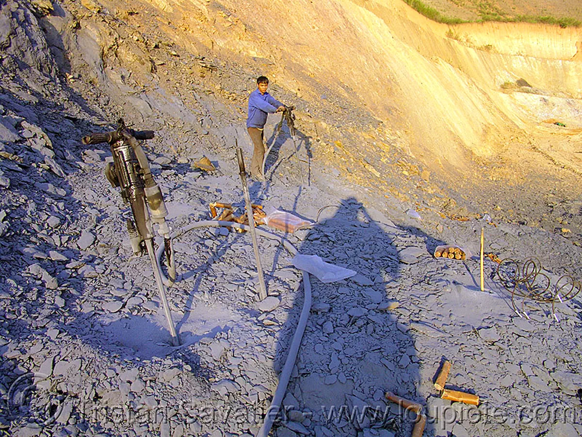 rock blasting with dynamite - road construction - vietnam, blasting caps, blasting charges, drilling and blasting, dynamite blasting, explosive, fuses, fuzes, groundworks, roadworks, stock photo