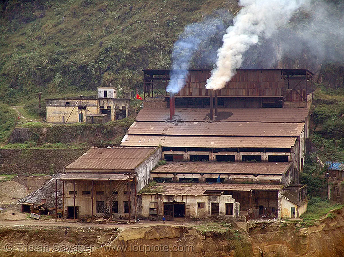 T&igrave;nh T&uacute;c (tinh tuc) tin mine smelter - vietnam, open pit mine, open pit surface mine, open-cut mine, opencast mine, pollution, smoke, strip mine, t&igrave;nh t&uacute;c, stock photo