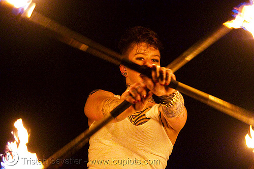 spinning fire staffs (san francisco) - fire dancer - leah