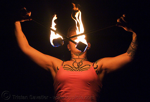 spinning fire poi (san francisco) - fire dancer - leah