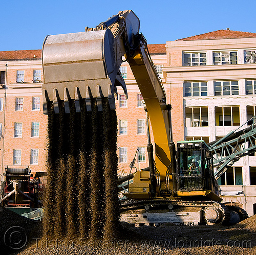 caterpillar 330D excavator - moving gravel
