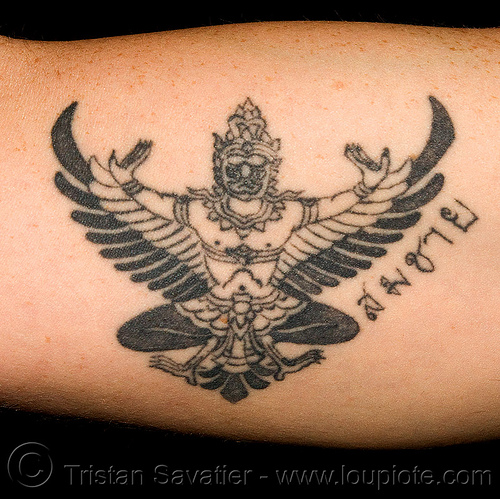 god tattoos. man-bird god, arm tattoo