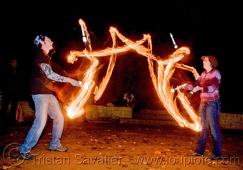 fire jugglers passing clubs fire clubs fire performers flame 