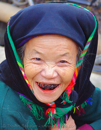 tribe woman with black teeth a cultural and traditional sign of beauty 