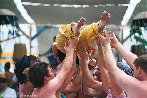 acroyoga at center camp - burning man 2003, acro-yoga, bare feet, barefoot, crowd, hands, held up, holding up, laying down, rian, ryan, woman