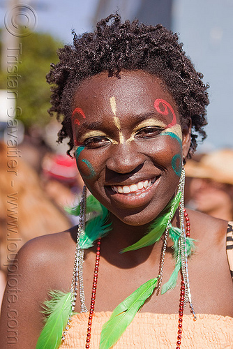 african woman with green feather earrings, african woman, awa, carnival costume, facepaint, feather earrings, samba dancer