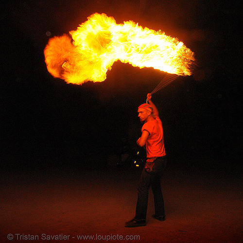 alex spinning a fire ball (san francisco), fire ball, fire dancer, fire dancing, fire performer, fire spinning, night, shanti alex, spinning fire