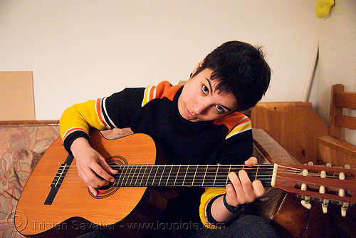 alyssa singing and playing the guitar in paris, guitar player, singing, woman