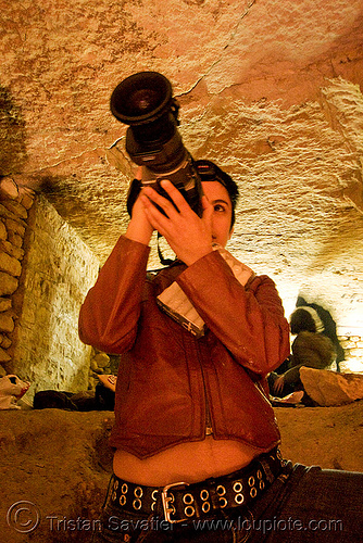 alyssa with video camera - catacombes de paris - catacombs of paris (off-limit area), camcorder, candles, cataphile, cave, clandestines, illegal, new year's eve, shooting, underground quarry, video camera, woman