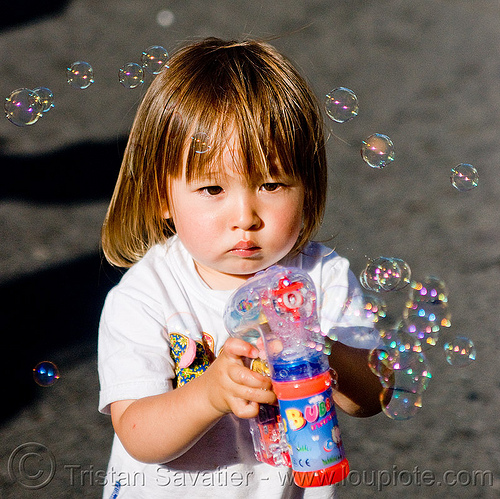 asian kid playing with bubble gun, boy, bubble gun, darius, haight street fair, kid, playing, soap bubbles, toddler, toy gun, young child