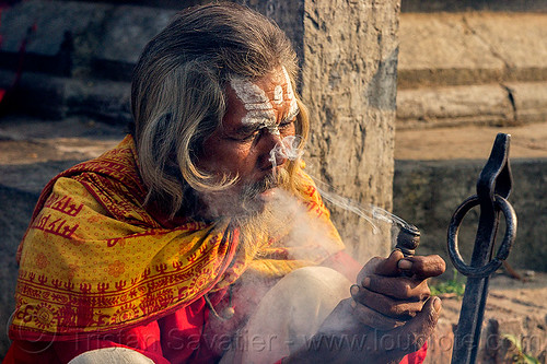 baba smoking a chillum of weed - ritual cannabis (nepal), baba smoking chillum, chillum pipe, dreadlocks, ganja, hindu man, hinduism, kathmandu, maha shivaratri, pashupatinath, sadhu, smoke, smoking pipe, smoking weed, tilak, tilaka