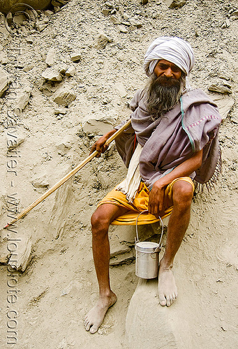 barefoot hindu pilgrim resting - amarnath yatra (pilgrimage) - kashmir, amarnath yatra, bare feet, barefoot, beard, headwear, hiking cane, hindu man, hindu pilgrimage, hinduism, holy man, kashmir, old man, pilgrim, resting, walking stick