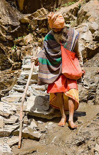 barefoot hindu pilgrim resting on trail - amarnath yatra (pilgrimage) - kashmir, amarnath yatra, bare feet, bearfoot, headwear, hiking cane, hindu pilgrimage, hinduism, kashmir, man, mountain trail, mountains, pilgrim, walking stick