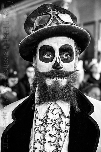 bearded man with skull makeup - steampunk costume - dia de los muertos, beard, day of the dead, dia de los muertos, face painting, facepaint, halloween, hat, lace shirt, man, mustache, night, steampunk, sugar skull makeup, vintage motorcycle googles