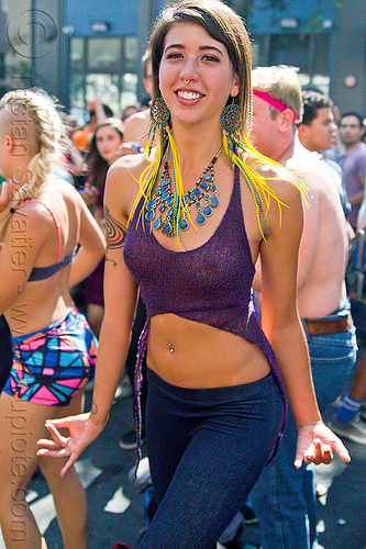 beautiful young woman - ariana, ariana, belly piercing, bellybutton piercing, blue stone necklace, dancing, feather earrings, gay pride festival, navel piercing, nose piercing, septum piercing, woman, yellow feathers