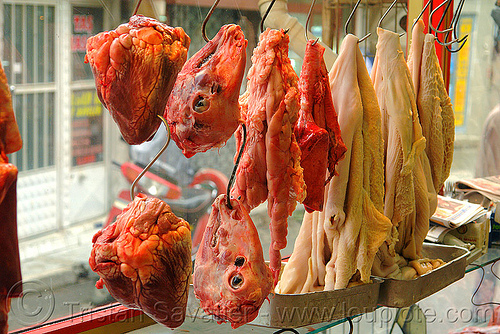 beef hearts, goat heads and tripe, beef hearts, chevon, goat heads, goat meat, halal meat, hanging, hooks, intestin, meat market, meat shop, mutton, raw meat, stomach