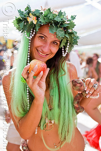 biblical eve with apple and snake, apple, attire, biblical, burning man outfit, crown, eve, green wig, headdress, leaves, maude, temptation, toy snake, woman
