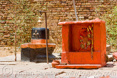 black lingam and shrine - fort hill - gwalior (india), bell, eyes, gwalior, hinduism, shiva linga, shiva lingam, shivling