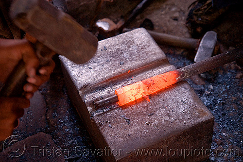 blacksmith hammering a gun barrel - gun factory - udaipur (india), antique guns, anvil, blacksmith, factory, fire arms, forging, glowing, ironwork, metal working, metalwork, rajasthan armoury, red hot, replicas, shotguns, udaipur, weapons, worker
