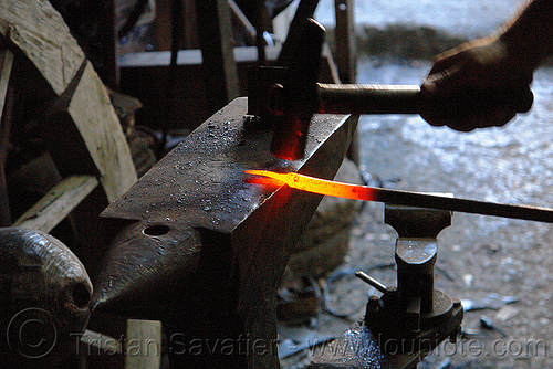 blacksmith hammering a red hot iron bar (turkey country), anvil, blacksmith, forging, glowing, hammer, hand, ironwork, metal working, metalwork, nail, red hot, rod, tool