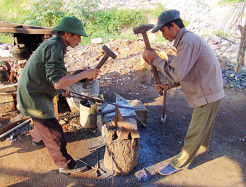 blacksmiths hammering hot iron on anvil - vietnam, anvil, blacksmiths, hammering, hammers, ironwork, ironworking, lang sơn, men, metalwork, metalworking, workers, working