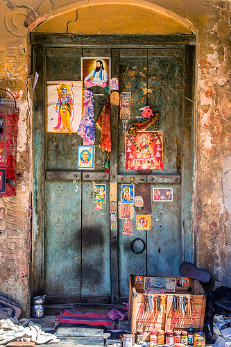 blue door decorated with posters of hindu deities and gurus (india), blue door, closed, deities, hindu, hinduism, posters, varanasi